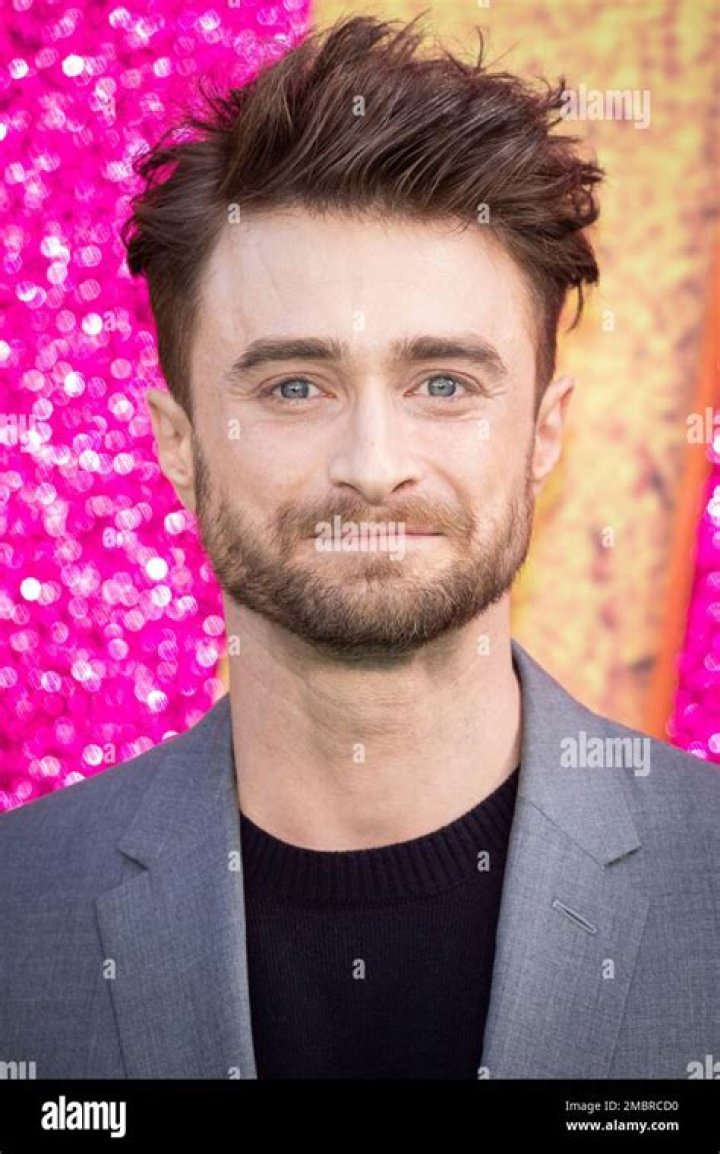 Daniel Radcliffe poses at the opening night of Stephen Sondheim's "Merrily We Roll Along" on Broadway at The Hudson Theater on October 8, 2023/Screenshot of Deadpool from the Deadpool & Wolverine trailer